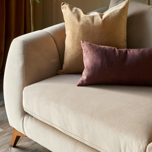 Genevieve champagne velvet 3 seater sofa with wooden leg