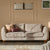 Genevieve champagne velvet 3 seater sofa with wooden leg